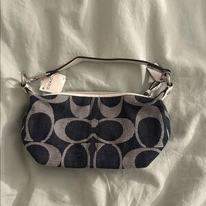 Coach Monogram Black and Cream Wristlet